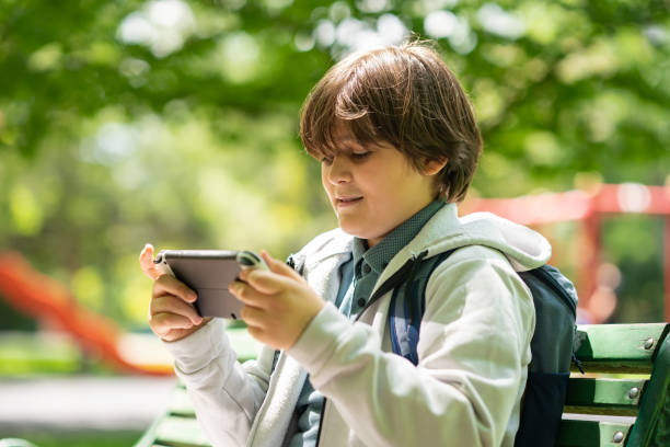 11 years old boy doing outdoor activities