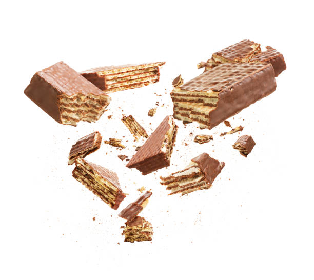istock Chocolate wafers are broken into pieces isolated on a white background 1405495447