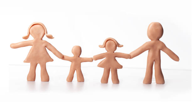 istock clay figurine family isolated on white background 1405501381