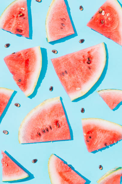 istock Sweet watermelon fruit on a blue background. 1405502556
