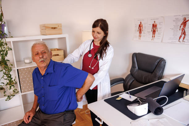 istock Senior man at doctor's office 1405506107
