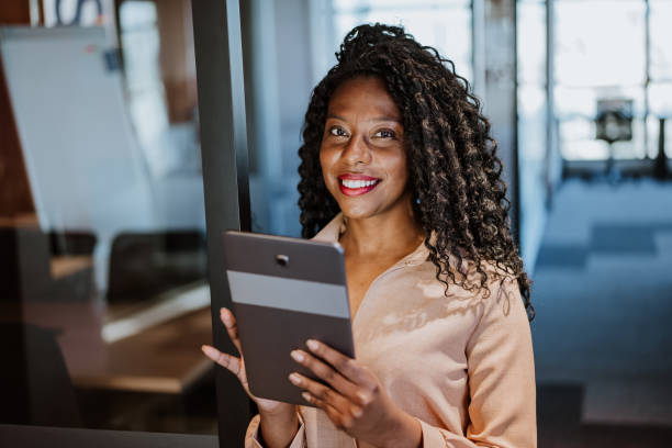 istock Businesswoman holding a digital tablet 1405507211