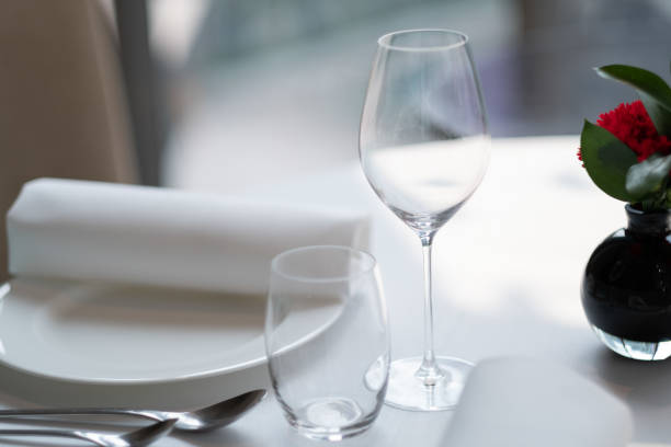 istock empty glass of water on the table with blur background 1405508152