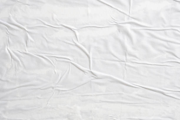 istock white crumpled and creased paper poster texture background 1405510274