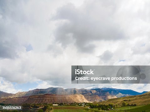 istock Western Colorado Daytime Stormy Day in Remote Arid Desert Climate Overlooking Palisade Orchards Photo Series 1405516263