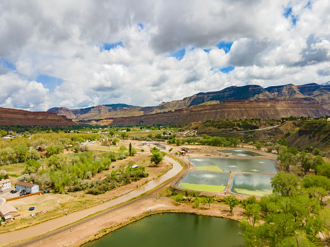 Colorado River Basin Agriculture, Green Space, Water Treatment Plant and BookCliff Mountain Range Summer Aerial Drone Photo Series