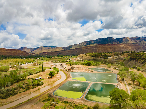 Colorado River Basin Agriculture, Green Space, Water Treatment Plant and BookCliff Mountain Range Summer Aerial Drone Photo Series