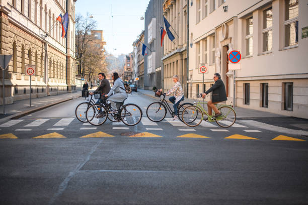 istock Safety First, Riding Bikes Though the Crosswalk 1405518536