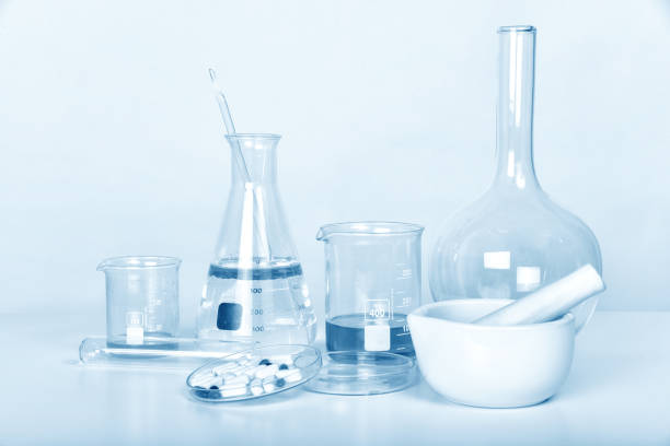 istock Pills and scientific laboratory glassware, Medicine research and development concept, Pharmaceutical quality control test. 1405519891