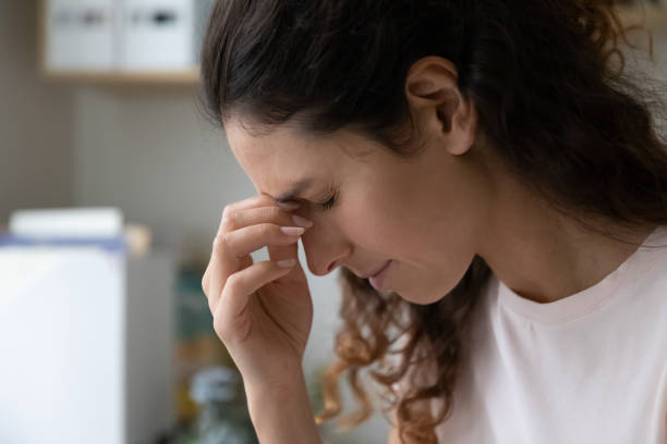 istock Close up face view sick sad woman with eyes closed 1405521752