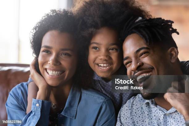 Happy Bonding African American Family Watching Smart Tv Stock Photo - Download Image Now