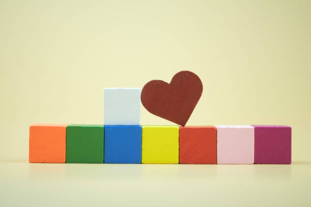 istock Red heart shape placed on colorful wood block 1405523077