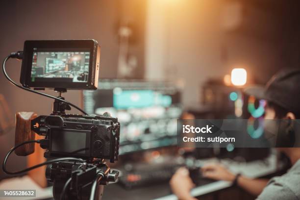 Camera Film Set On The Tripod Equipment Gear In The Studio Of Blogger Stock Photo - Download Image Now