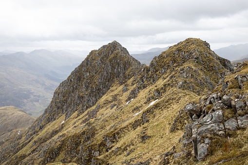 Hiking the rugged Forcan Ridge mountain near Loch Shiel in the northwest Scottish Highlands.