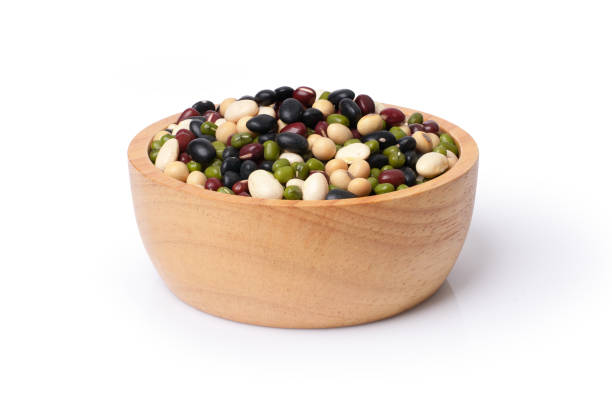 Mix beans in wooden bowl