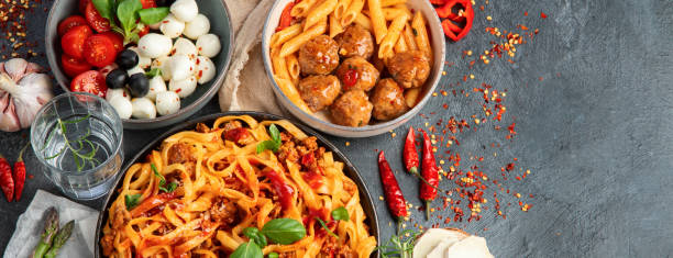 istock Italian food assortment on dark background. 1405534752