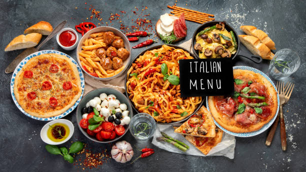 istock Italian food assortment on dark background. 1405534761
