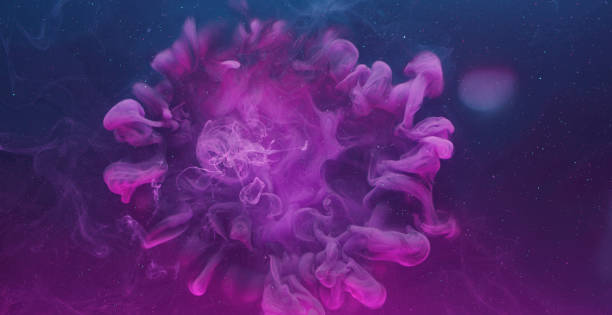 istock ink color blend paint water drop pink blue splash 1405534893