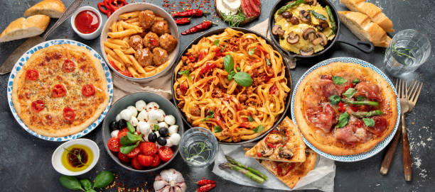 istock Italian food assortment on dark background. 1405534920