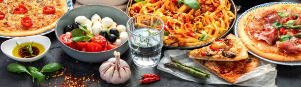 istock Italian food assortment on dark background. 1405535059