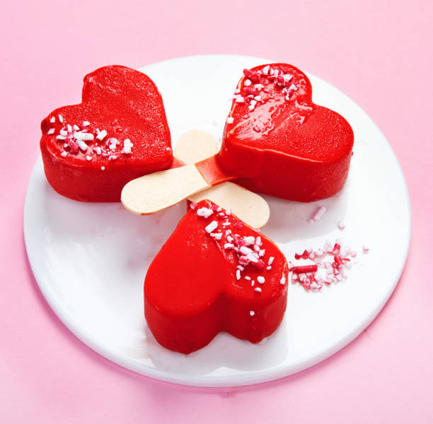 istock Red strawberry ice-cream on pink background. 1405535853