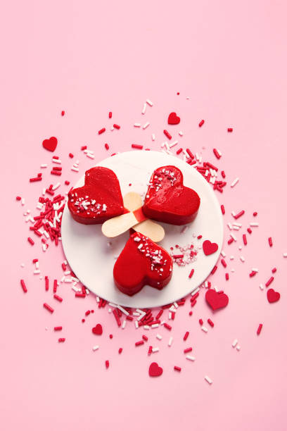 istock Red strawberry ice-cream on pink background. 1405535883