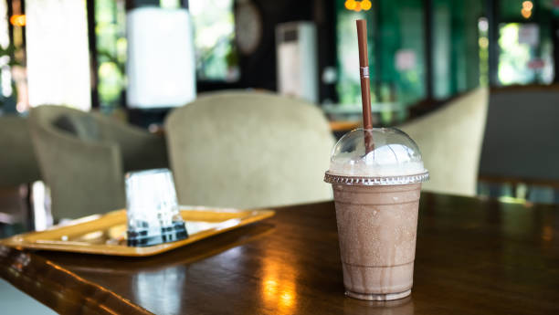 istock Cocoa Smoothie in glass on wooden table 1405535952