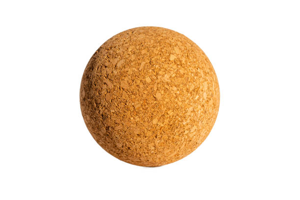 Nice brown cork ball isolated on a white isolated background,close up. Nice brown cork ball isolated on a white isolated background,close up. cork material stock pictures, royalty-free photos & images