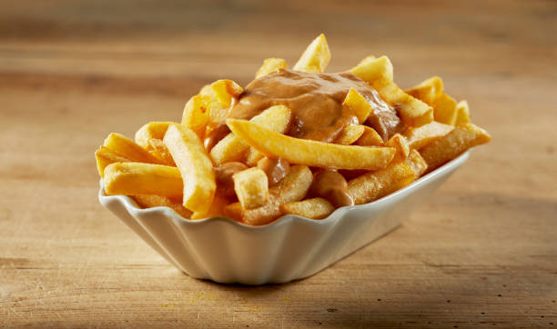 istock Hot chips with smooth sauce in ceramic bowl 1405543825
