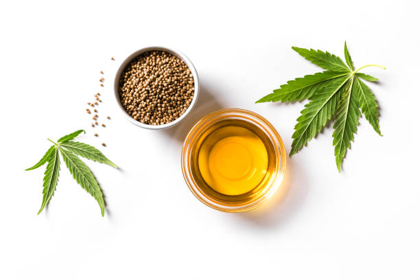 Hemp cannabis oil, leaves and seeds stock photo