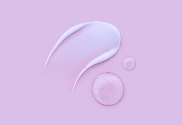 istock cosmetic smears cream texture on pink background 1405547329