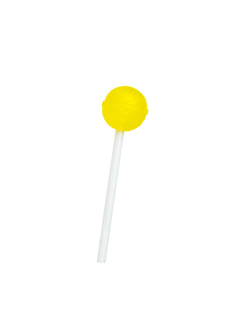 Bright yellow lollipop isolated on a white background. A popular delicious candy. Minimal concept. Sweet candies.