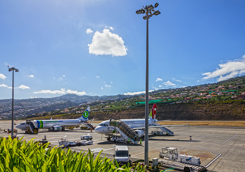 Funchal, Portugal - June 27, 2022: Airplanes in Funchal airport of Madeira island