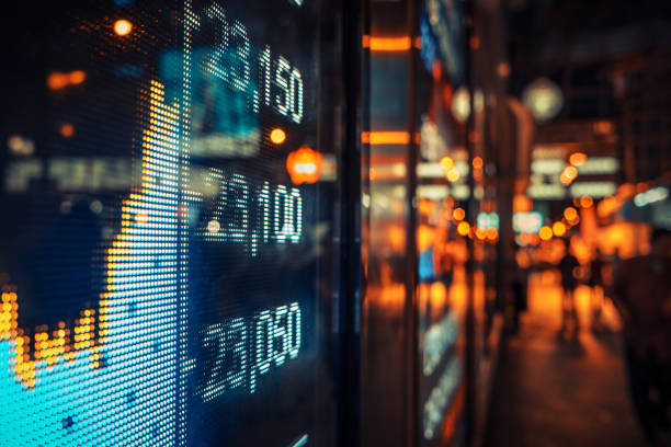 Financial stock exchange market display screen board on the street, selective focus stock photo