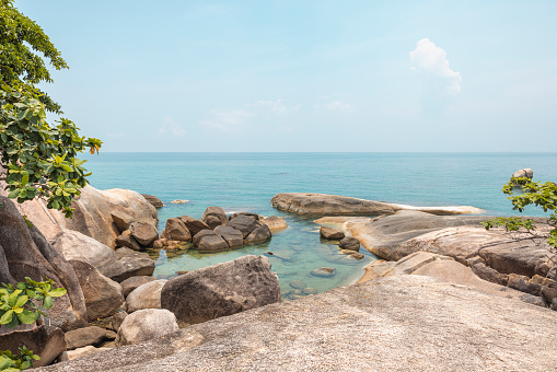 Sea landscape with rocks in the foreground and sky in the background. Therapeutic natural scenery gives a feeling of relaxation. At Koh Samui, Surat Thani Province, Thailand.