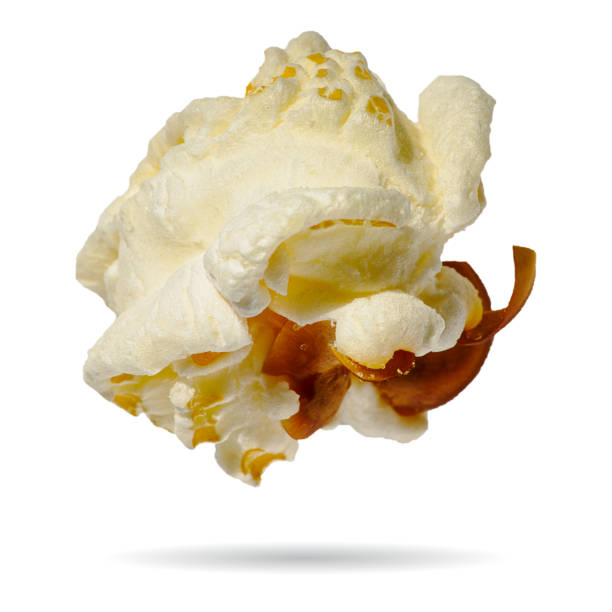 istock Popcorn isolated on white. macro shoot of popcorn. 1405555924