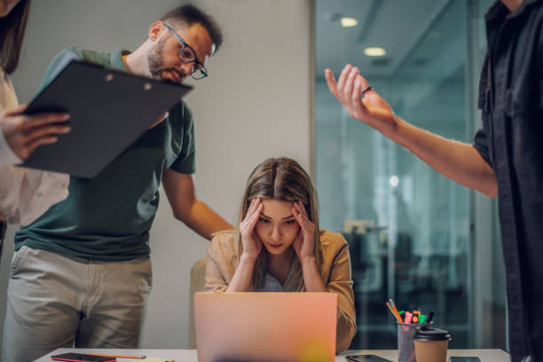 istock Stressed business colleagues having a meeting in an office and solving problems 1405558393