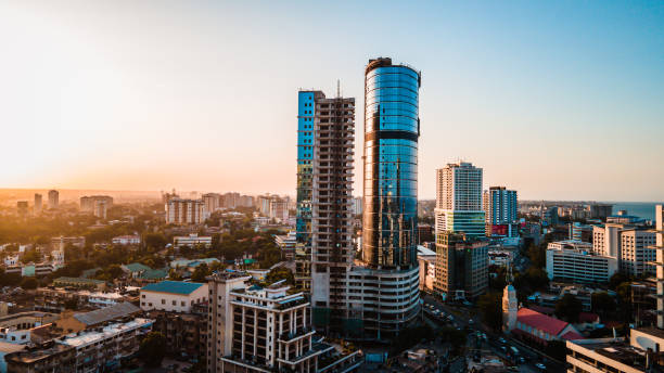 Dar es Salaam - Tanzania - June 16 2022 - Cityscape of Dar es Salaam at sunset featuring residential and office buildings.