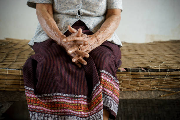 istock Hands of senior woman 1405569426
