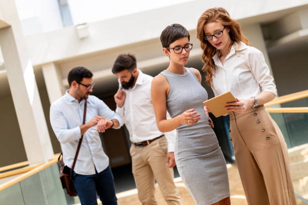 istock Collaboration and analysis by business people working together in office 1405574217