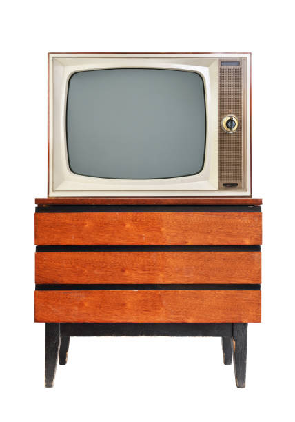 istock An old television set isolated on a white background stands on a vintage bedside table from the 1960s,1980s,1970s. 1405577079