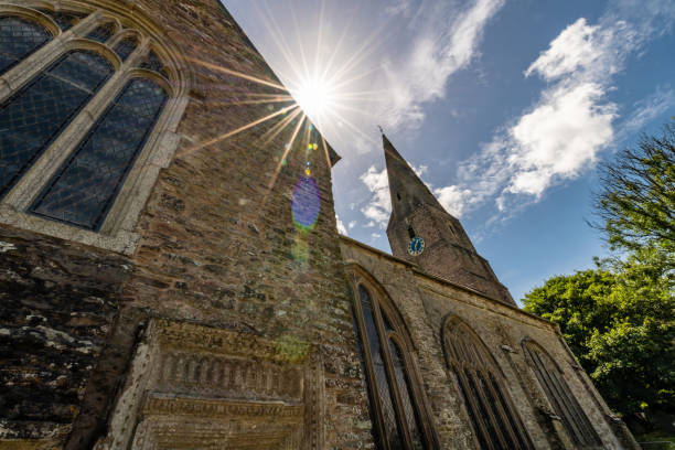 istock Sun shines over St George's Church in Modbury, Devon 1405579312