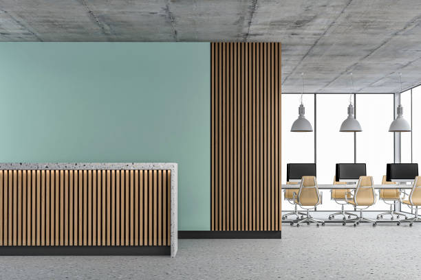 istock Empty office interior with copy space, work desks and reception desk on terrazzo floor 1405581683
