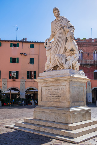 The white marble statue of Leopold II of Tuscany, better known as Canapone, sculpted by artist Luigi Magi, was positioned in 1846 in Piazza Dante, the main square in Grosseto.