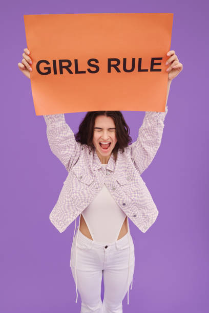 istock Girl expressing her rules with poster 1405594375