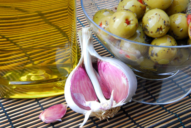 close up of the olives stuffed with pepper and olive oils