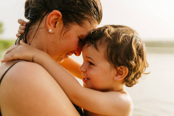 istock With mommy on the lake 1405595776