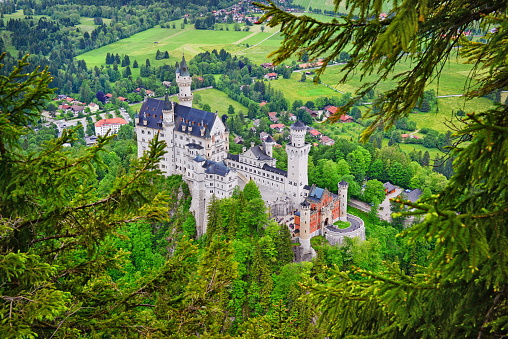 Neuschwanstein Castle in Schwangau, Bavaria, Germany as seen from above on a sunny day