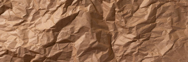 banner de fondo de textura de papel artesanal arrugado - paper craft brown wrinkled fotografías e imágenes de stock