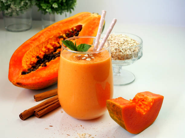 istock Smoothies made from papaya, oat-flakes, cinnamon, vegetable milk. 1405609488